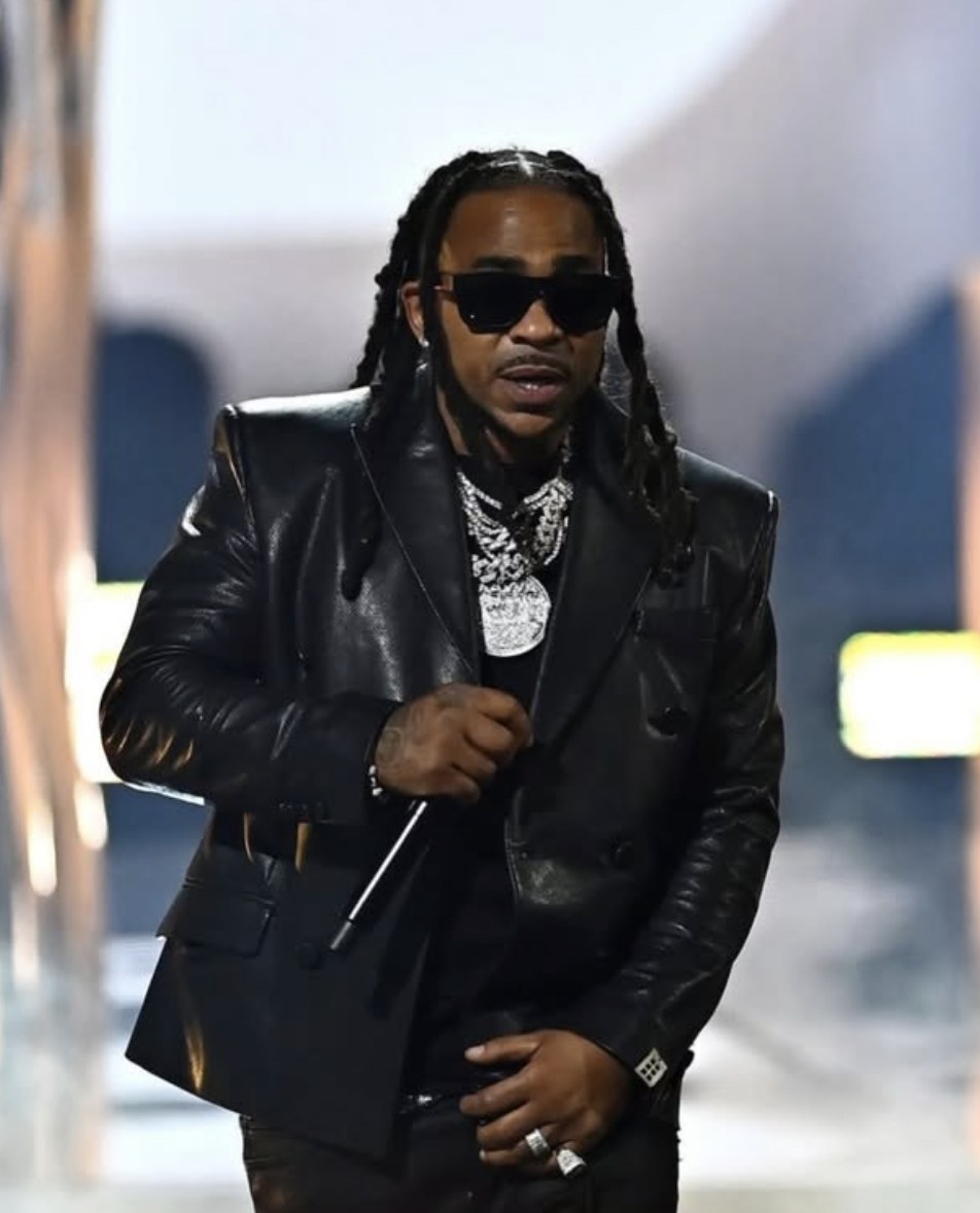 Max B on the awards stage in black leather