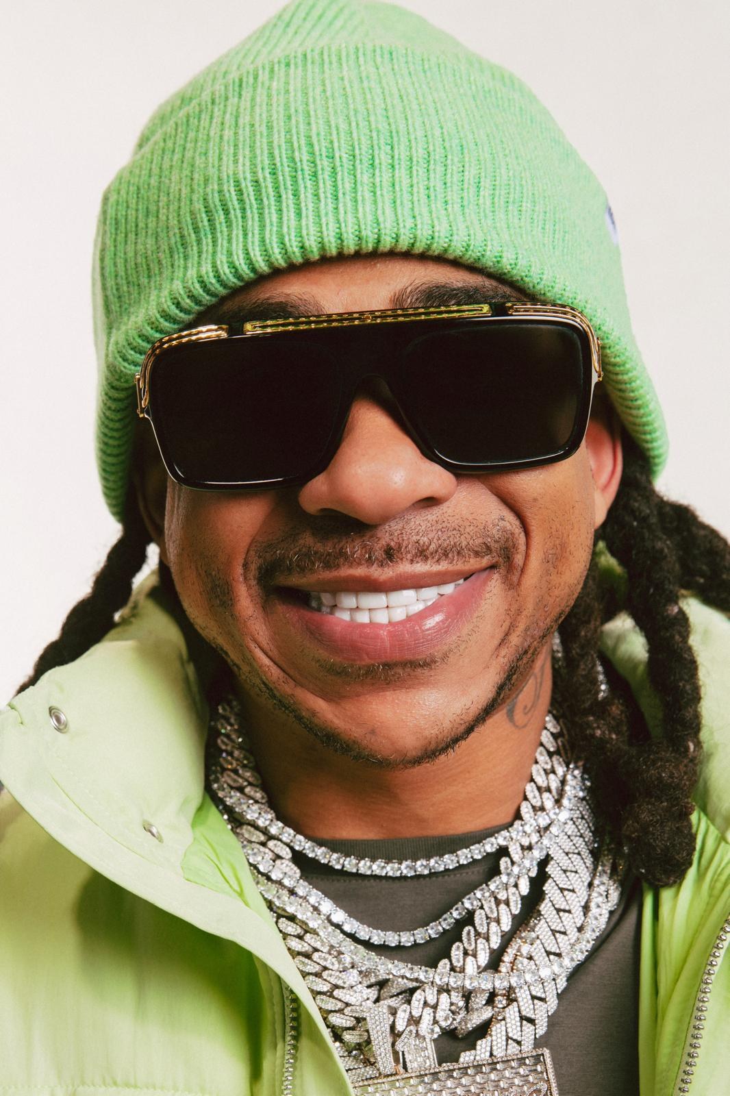 Max B studio portrait, green beanie